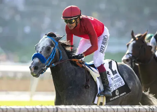 First Peace and jockey Mike Smith win the Grade II $750,000 California Crown Eddie D Stakes Saturday, Sept. 28, 2024 at Santa Anita Park in Arcadia, Calif. (Benoit Photo via AP)