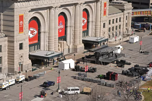 Workers dismantle the stage outside of Union Station Thursday, Feb. 15, 2024, in Kansas City, Mo. On Friday, Feb. 16, The Associated Press reported on stories circulating online incorrectly claiming a 44-year-old migrant was identified as one of the shooters at the Kansas City Chiefs’ Super Bowl parade on Wednesday. (AP Photo/Charlie Riedel, File)