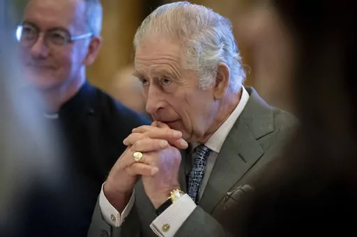 Britain's King Charles III hosts a gathering of young UK community and faith leaders to discuss the challenges their communities face, at Buckingham Palace, in London, Wednesday, Dec. 13, 2023. Buckingham Palace says King Charles III will undergo a “corrective procedure” next week for an enlarged prostate. (Aaron Chown/Pool Photo via AP, File)