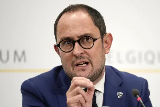 Belgian Minister of Justice Vincent Van Quickenborne gestures as he speaks during a press conference in Brussels, on Oct. 17, 2023. Belgium's justice minister resigned on Friday, Oct. 20, 2023 after it was discovered that Tunisia was seeking the extradition last year of an Islamic extremist who shot dead two Swedes and wounded a third this week in Brussels. (AP Photo/Martin Meissner, File)