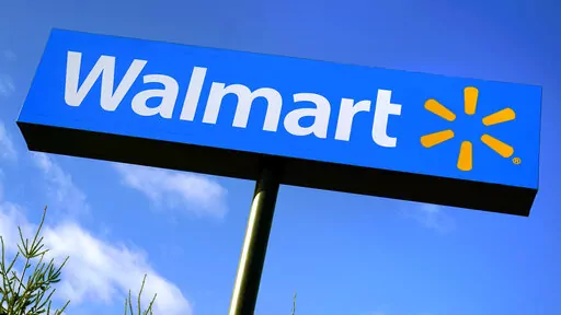 In this Nov. 18, 2020 file photo, a Walmart store sign is visible from Route 28 in Derry, N.H. Walmart reports their financial earnings on Tuesday, Feb. 21, 2023. (AP Photo/Charles Krupa, File)