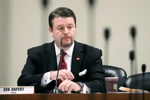State Sen. Jason Rapert, R-Conway, presides over a Senate committee at the state Capitol on March 14, 2018, in Little Rock, Ark. Rapert, a former Arkansas lawmaker who has proposed suspending funding to libraries suing the state over restrictions on materials was confirmed by the Senate Monday, Dec. 11, 2023 to a spot on the state library board. (AP Photo/Kelly P. Kissel, File)