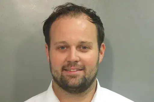 This undated photo provided by Washington County, Ark., Detention Center shows Josh Duggar. The Supreme Court has rejected an appeal from Josh Duggar, a former reality television star convicted of downloading child sexual abuse images. Duggar was on the TLC show “19 Kids and Counting” with his large family before his 2021 conviction. (Washington County Detention Center via AP, File)