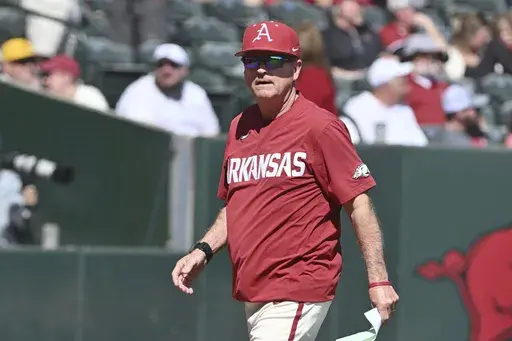Arkansas coach Dave Van Horn heads to the dug out against Murray State during an NCAA baseball game, in Fayetteville, Ark., March 3, 2024. (AP Photo/Michael Woods, File)