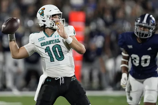 Coastal Carolina quarterback Grayson McCall (10) passes in the pocket against Georgia Southern during the first half of an NCAA college football game, Saturday, Sept. 30, 2023, in Statesboro, Ga. (AP Photo/Mike Stewart)