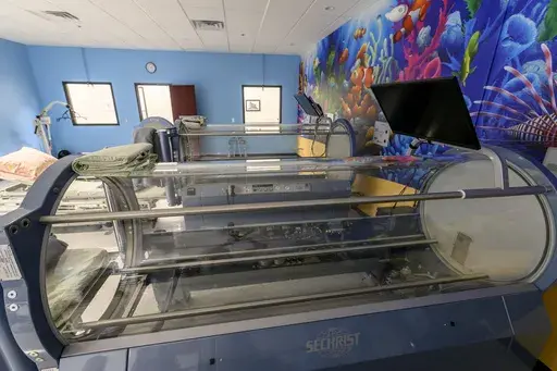 A hyperbaric chamber at the Oxford Center in Brighton, Mich., is shown Feb. 8, 2024. (David Guralnick/Detroit News via AP, file)