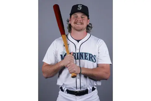 Hogan Windish of the Seattle Mariners baseball team poses in Peoria, Ariz., Feb. 23, 2024. Windish, a 25-year-old prospect in the Seattle Mariners' minor league system, had four homers and nine RBIs for the Double-A Arkansas Travelers in a 9-4 win at the Springfield Cardinals in the Texas League on Tuesday night, June 25.(AP Photo/Lindsey Wasson, File)