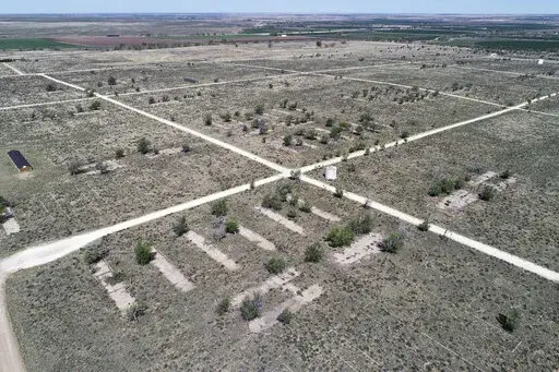This photo shows the foundation of barracks at Camp Amache in Granada, Colo., on Thursday, May 6, 2021. President Joe Biden signed a bipartisan bill into law Friday, March 18, 2022, designating a former World War II Japanese American internment camp in rural Colorado as a federal historic site managed by the National Park Service. Camp Amache is owned by the town of Granada and is listed on the National Register of Historic Places. (Hyoung Chang/The Denver Post via AP, File)