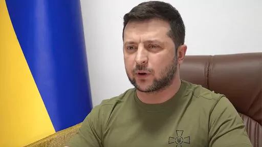 In this image from video provided by the Ukrainian Presidential Press Office and posted on Facebook, Ukrainian President Volodymyr Zelenskyy speaks to members of the U.S. Congress from Kyiv, Ukraine, on Wednesday, March 16, 2022. Zelenskyy summoned the memory of Pearl Harbor and the Sept. 11, 2001, terror attacks in appealing to the U.S. Congress to do more to help Ukraine's fight against Russia. President Joe Biden said the U.S. is sending more anti-aircraft, anti-armor weapons and drones. (Ukr