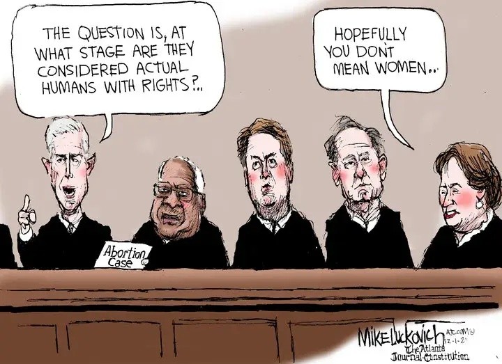 Mike Luckovich for Dec 01, 2021